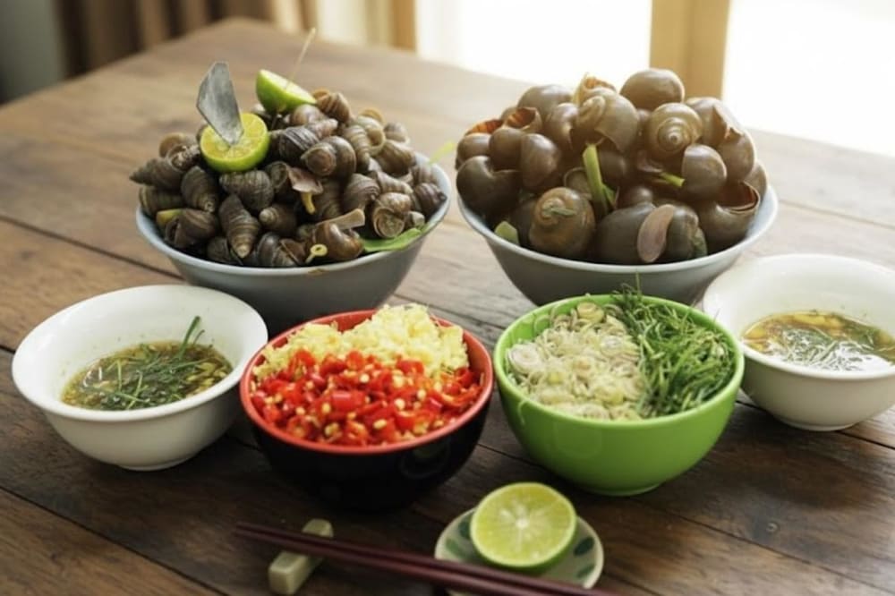 Thưởng thức đặc sản ốc gạo T&acirc;n Phong hấp dẫn tại Tiền Giang